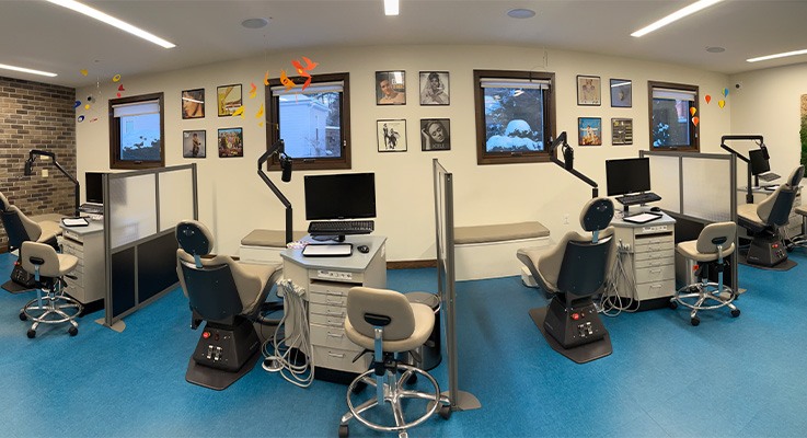 Waiting room with high white ceiling in Greenfield orthodontic office