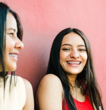 Two smiling girls with braces in Greenfield