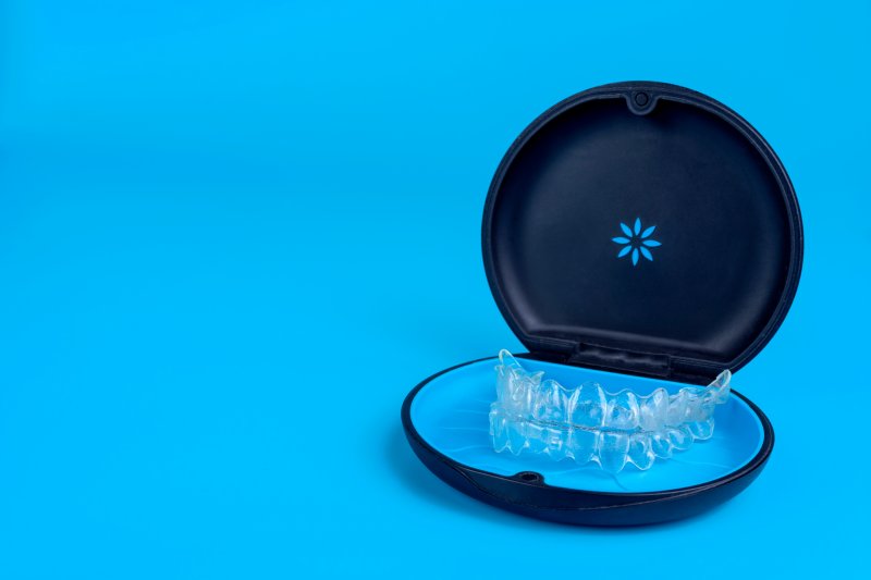 Set of Invisalign aligners in a protective case
